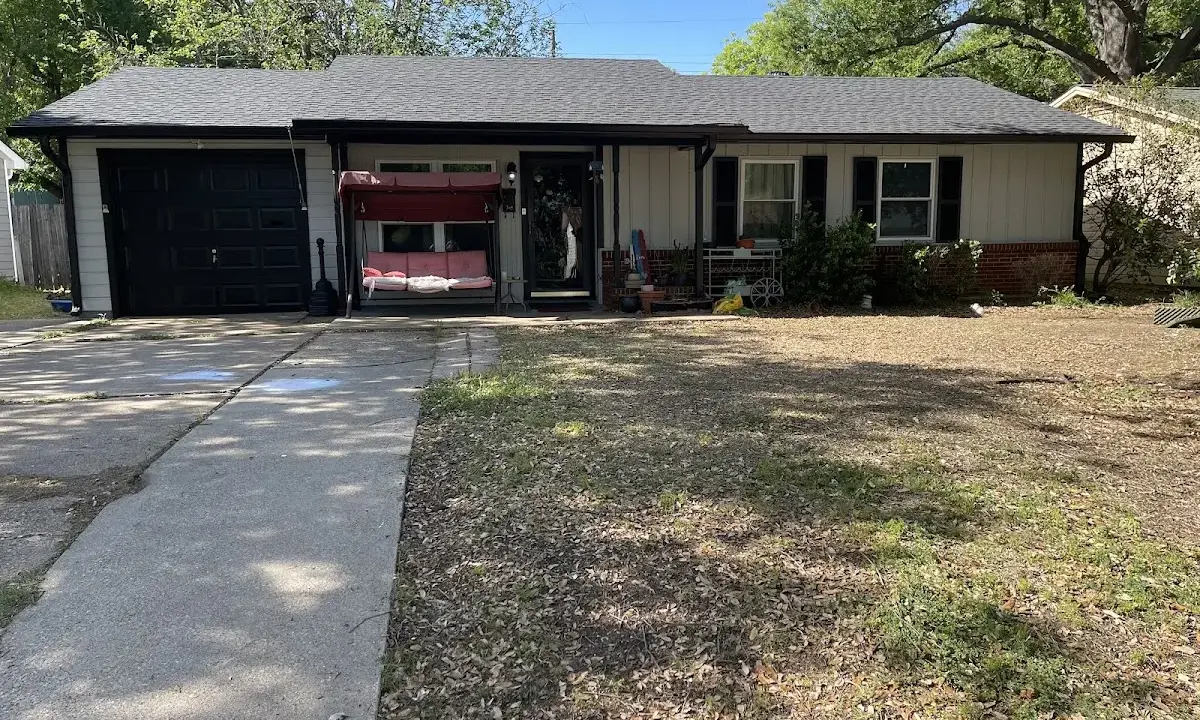 Hail Damage Roof Repair crew at work on a residential roof in Augusta